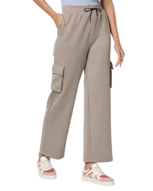 Beige cargo pants worn by a person on a white background